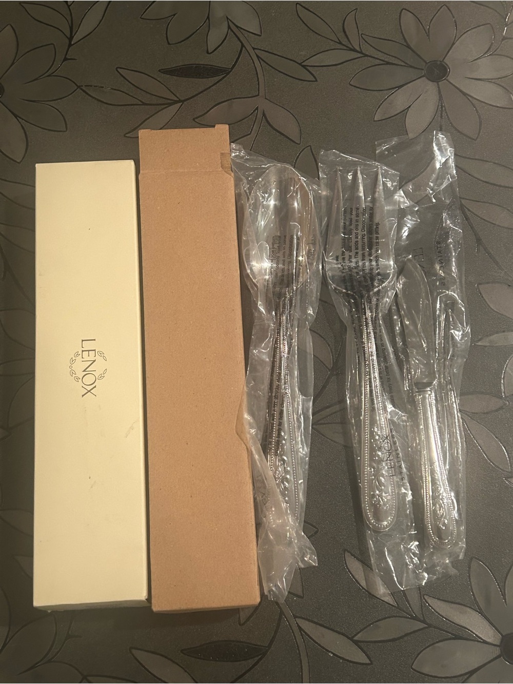 Lenox serving set - brand new not opened. Makes a beautiful present. Bar code